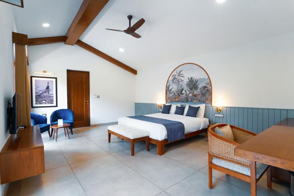Spacious bedroom in luxury villa in Jim Corbett with modern interiors