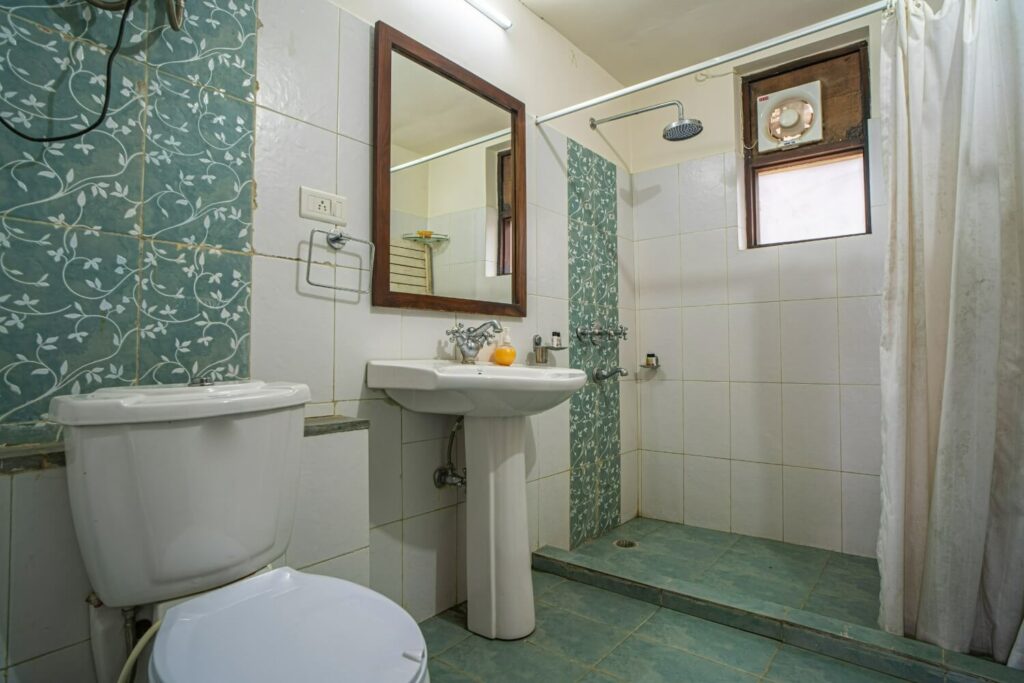 bathroom with shower area in Ranikhet villa