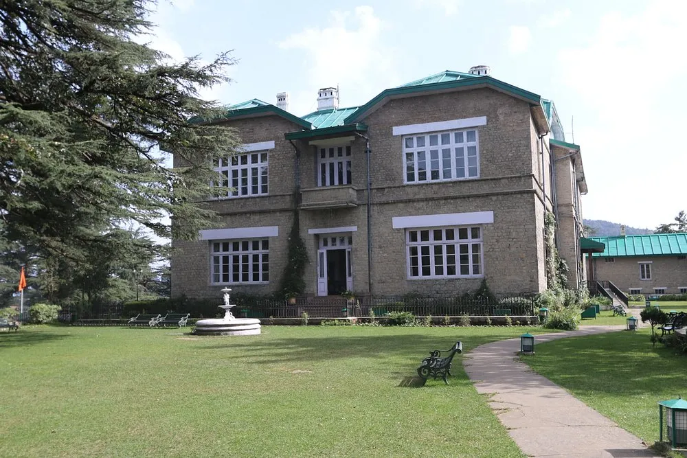 Historic Chail Palace surrounded by lush greenery